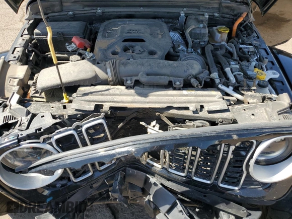 2024 Jeep Wrangler Sahara z VIN 1C4RJXP6XRW274744, wystawiony jako Copart lot #48572555 z przebiegiem 26 306 mil mil oraz Szkoda całkowita • Salvage title. Historia ofert i sprzedaży dostępna na DreamBid. Obrazek 11.
