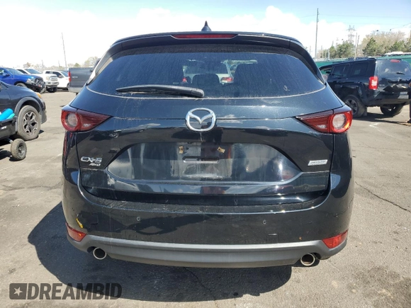 2018 Mazda CX-5 Touring with VIN JM3KFBCM4J0466234, listed as a Copart auction lot 51617095 with 58,200 mi miles and Salvage Title. Bid and sale history available at carsss.com. Image 6.