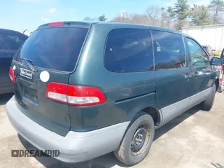 2002 Toyota Sienna LE with VIN 4T3ZF13C32U456123, listed as a IAAI auction lot 42084436 with 242,408 mi miles. Bid and sale history available at carsss.com. Image 4.