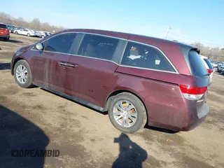 2014 Honda Odyssey EX-L with VIN 5FNRL5H60EB009083, listed as a IAAI auction lot 41633419 with 219,930 mi miles and . Bid and sale history available at carsss.com. Image 3.