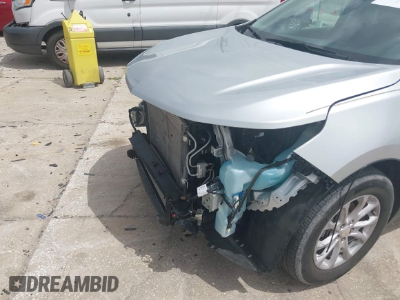 2021 Chevrolet Equinox LT z VIN 3GNAXKEV0MS165682, wystawiony jako IAAI lot #42419436 z przebiegiem 42 199 mil mil oraz . Historia ofert i sprzedaży dostępna na DreamBid. Obrazek 19.