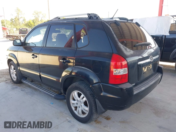 2007 Hyundai Tucson SE with VIN KM8JN12D07U475917, listed as a IAAI auction lot 41872876 with 172,006 mi miles. Bid and sale history available at carsss.com. Image 3.