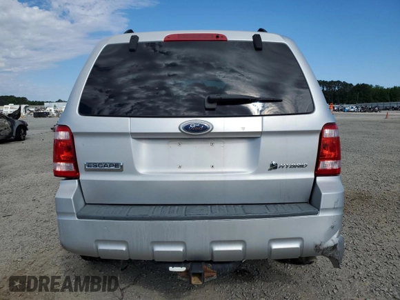 2009 Ford Escape Hybrid z VIN 1FMCU49399KD02275, wystawiony jako Copart lot #55536955 z przebiegiem 50 333 mil mil oraz Szkoda całkowita • Salvage title. Historia ofert i sprzedaży dostępna na DreamBid. Obrazek 6.