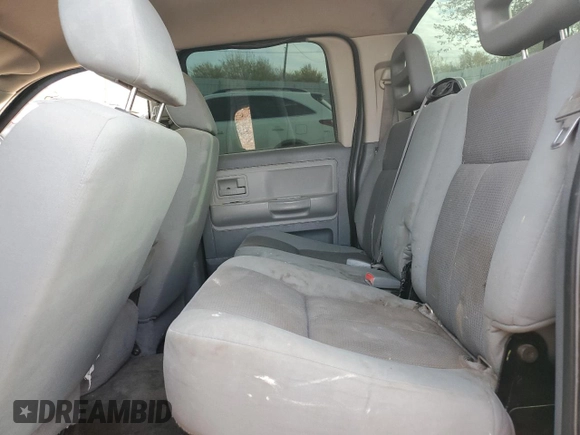 2005 Dodge Dakota SLT z VIN 1D7HW48K45S139614, wystawiony jako Copart lot #83898134 z przebiegiem 200 188 mil mil oraz Szkoda całkowita • Salvage title. Historia ofert i sprzedaży dostępna na DreamBid. Obrazek 10.