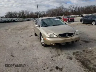 2000 Mercury Sable LS Premium z VIN 1MEFM55S0YA621927, wystawiony jako Copart lot #87052444 z przebiegiem 34 930 mil mil oraz Szkoda całkowita • Salvage title. Historia ofert i sprzedaży dostępna na DreamBid. Obrazek 10.