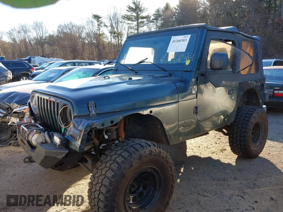 2005 Jeep Wrangler SE with VIN 1J4FA29155P366432, listed as a IAAI auction lot 41260303 with 134,021 mi miles. Bid and sale history available at carsss.com. Image 2.