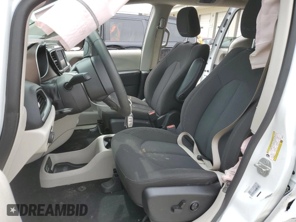 2023 Chrysler Voyager LX z VIN 2C4RC1CG0PR601874, wystawiony jako Copart lot #56747115 z przebiegiem 51 210 mil mil oraz Nie do naprawy. Historia ofert i sprzedaży dostępna na DreamBid. Obrazek 7.
