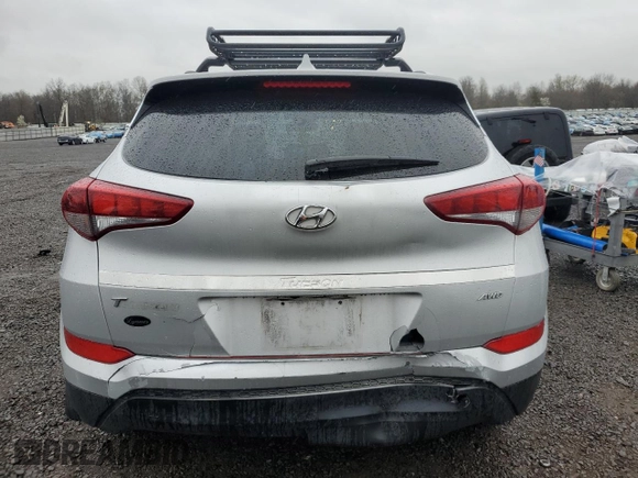 2018 Hyundai Tucson SEL z VIN KM8J3CA45JU653573, wystawiony jako Copart lot #52347265 z przebiegiem 222 959 mil mil oraz Szkody całkowita. Historia ofert i sprzedaży dostępna na DreamBid. Obrazek 6.