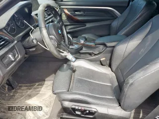 2014 BMW 4 Series 428i with VIN WBA3N3C55EK230214, listed as a Copart auction lot 56896865 with 77,024 mi miles and Salvage title. Bid and sale history available at DreamBid. Image 7.
