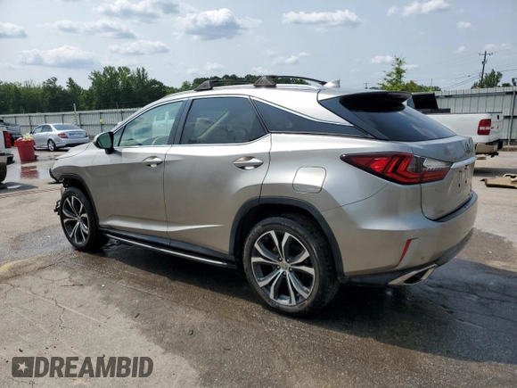 2017 Lexus RX 350 with VIN 2T2ZZMCA2HC052610, listed as a Copart auction lot 58565945 with 137,956 mi miles and Salvage title. Bid and sale history available at DreamBid. Image 2.