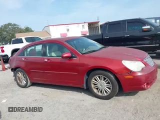 2007 Chrysler Sebring Limited z VIN 1C3LC66K27N529614, wystawiony jako IAAI lot #42198818 z przebiegiem 256 298 mil mil oraz . Historia ofert i sprzedaży dostępna na DreamBid. Obrazek 13.