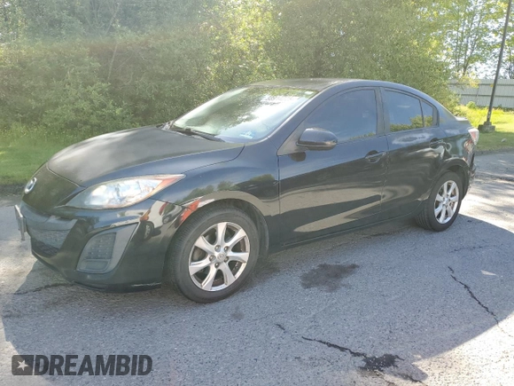 2011 Mazda 3 i Touring z VIN JM1BL1VG9B1359310, wystawiony jako Copart lot #58914225 z przebiegiem 144 919 mil mil oraz Czysty tytuł • Clean title. Historia ofert i sprzedaży dostępna na DreamBid. Obrazek 1.