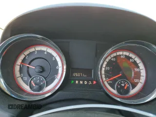 2013 Dodge Grand Caravan SXT with VIN 2C4RDGCG0DR582254, listed as a Copart auction lot 54735205 with 126,071 mi miles and Salvage Title. Bid and sale history available at DreamBid. Image 9.