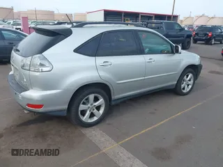 2005 Lexus RX 330 with VIN JTJGA31U050052280, listed as a IAAI auction lot 42131996 with 242,995 mi miles. Bid and sale history available at carsss.com. Image 4.