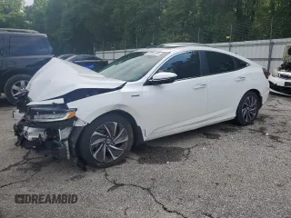 2021 Honda Insight Touring z VIN 19XZE4F99ME005331, wystawiony jako Copart lot #57851395 z przebiegiem 100 892 mil mil oraz Szkoda całkowita • Salvage title. Historia ofert i sprzedaży dostępna na DreamBid. Obrazek 1.