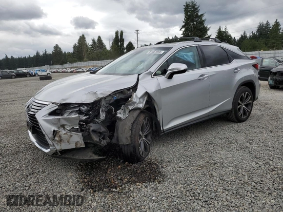 2016 Lexus RX 350 with VIN JTJBZMCA5G2005796, listed as a Copart auction lot 64453905 with 69,784 mi miles and Salvage title. Bid and sale history available at DreamBid. Image 1.