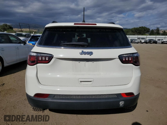 2018 Jeep Compass Latitude with VIN 3C4NJCBB7JT233848, listed as a Copart auction lot 56502715 with 94,665 mi miles and Salvage title. Bid and sale history available at DreamBid. Image 6.