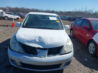 2008 Nissan Versa 1.8 S with VIN 3N1BC13E08L358648, listed as a IAAI auction lot 41773227 with 149,887 mi miles. Bid and sale history available at carsss.com. Image 13.