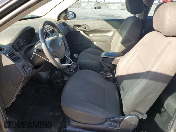 2007 Ford Focus S with VIN 1FAFP31N27W201266, listed as a Copart auction lot 51789625 with 211,274 mi miles and Salvage Title. Bid and sale history available at DreamBid. Image 7.