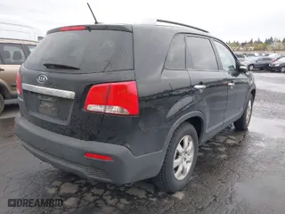 2012 Kia Sorento LX with VIN 5XYKTDA64CG309107, listed as a IAAI auction lot 41977359 with 213,006 mi miles. Bid and sale history available at carsss.com. Image 4.