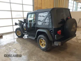 2006 Jeep Wrangler Sport with VIN 1J4FA49S96P733712, listed as a IAAI auction lot 41572913 with 93,511 mi miles. Bid and sale history available at carsss.com. Image 3.
