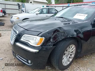 2013 Chrysler 300 with VIN 2C3CCAAG8DH515050, listed as a IAAI auction lot 41905134 with 137,837 mi miles. Bid and sale history available at carsss.com. Image 6.