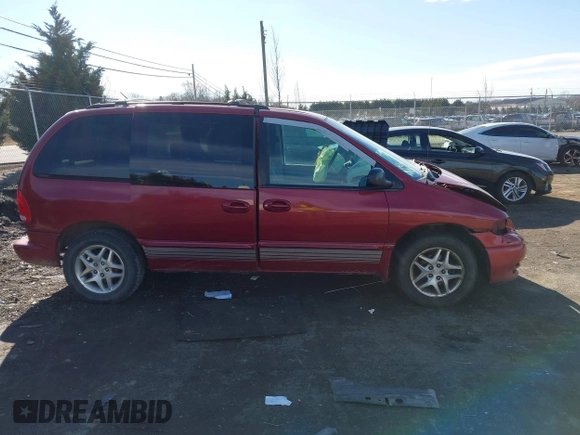 1999 Dodge Caravan z VIN 1B4GP45G7XB554879, wystawiony jako IAAI lot #41644242 z przebiegiem Nie podano mil oraz . Historia ofert i sprzedaży dostępna na DreamBid. Obrazek 14.
