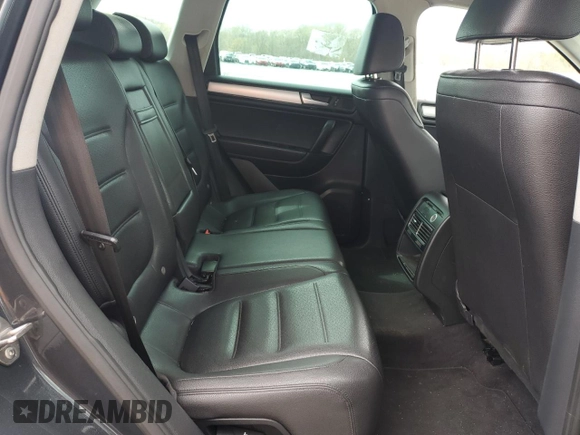 2012 Volkswagen Touareg Sport с VIN WVGEK9BP7CD006059, выставлен на аукционе Copart как лот 49411245 с пробегом 202 323 миль миль и Чистый • Clean title. История ставок и продаж доступна на DreamBid. Изображение 11.
