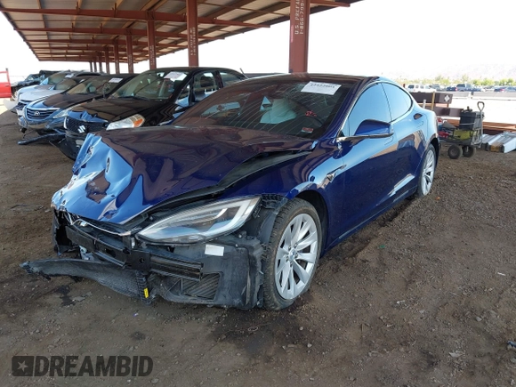 2017 Tesla Model S 100D z VIN 5YJSA1E21HF190815, wystawiony jako IAAI lot #42422004 z przebiegiem 99 938 mil mil oraz . Historia ofert i sprzedaży dostępna na DreamBid. Obrazek 2.