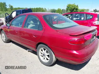 2000 Ford Contour SE Fleet z VIN 1FAFP66L2YK119281, wystawiony jako IAAI lot #42797519 z przebiegiem 46 808 mil mil oraz . Historia ofert i sprzedaży dostępna na DreamBid. Obrazek 3.