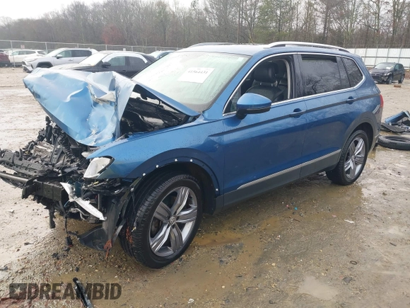 2020 Volkswagen Tiguan SE z VIN 3VV3B7AX5LM176136, wystawiony jako IAAI lot #41564431 z przebiegiem 74 867 mil mil oraz . Historia ofert i sprzedaży dostępna na DreamBid. Obrazek 2.