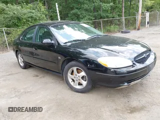 2002 Ford Taurus SES Standard z VIN 1FAFP55S92G250401, wystawiony jako IAAI lot #42432014 z przebiegiem 231 695 mil mil oraz . Historia ofert i sprzedaży dostępna na DreamBid. Obrazek 1.