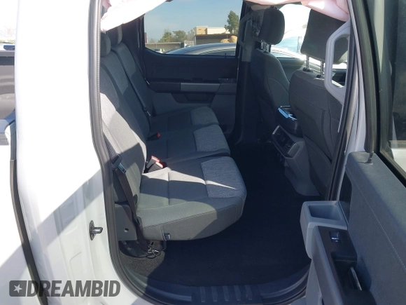 2023 Ford F-150 Lightning Pro z VIN 1FTVW1EL6PWG01336, wystawiony jako IAAI lot #41692903 z przebiegiem 39 085 mil mil oraz . Historia ofert i sprzedaży dostępna na DreamBid. Obrazek 8.