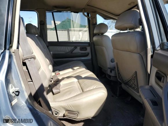 1996 Toyota Land Cruiser with VIN JT3HJ85J0T0145838, listed as a Copart auction lot 77593764 with 158,507 mi miles and Salvage Title. Bid and sale history available at carsss.com. Image 12.