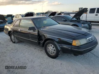 1988 Ford Thunderbird with VIN 1FABP60F9JH246775, listed as a Copart auction lot 77428264 with Not Provided miles and Salvage Title. Bid and sale history available at DreamBid. Image 4.