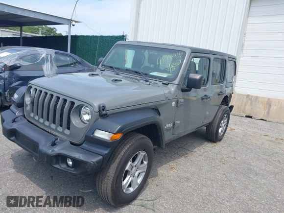 2020 Jeep Wrangler Unlimited Black and Tan with VIN 1C4HJXDG3LW298223, listed as a IAAI auction lot 42446032 with 17,688 mi miles and . Bid and sale history available at DreamBid. Image 2.