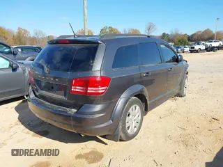2018 Dodge Journey SE with VIN 3C4PDCABXJT183318, listed as a IAAI auction lot 40985444 with 164,051 mi miles. Bid and sale history available at carsss.com. Image 4.