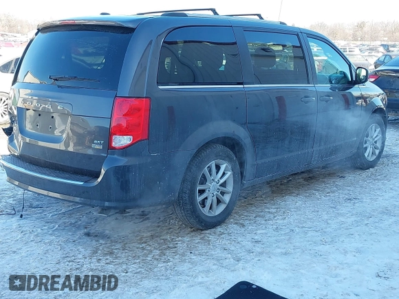 2019 Dodge Grand Caravan SXT with VIN 2C4RDGCG9KR637121, listed as a IAAI auction lot 41636355 with 177,073 mi miles and . Bid and sale history available at DreamBid. Image 4.
