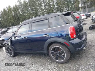 2015 MINI Countryman S z VIN WMWZC3C57FWT06297, wystawiony jako IAAI lot #41988157 z przebiegiem 74 461 mil mil oraz . Historia ofert i sprzedaży dostępna na DreamBid. Obrazek 15.