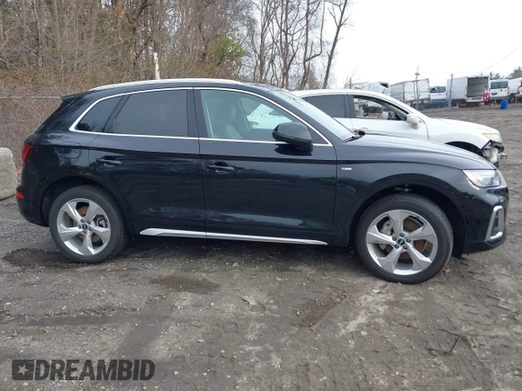 2022 Audi Q5 S line Premium Plus z VIN WA1EAAFY5N2027089, wystawiony jako IAAI lot #39093168 z przebiegiem 24 523 mil mil oraz . Historia ofert i sprzedaży dostępna na DreamBid. Obrazek 13.
