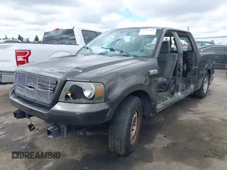 2005 Ford F-150 XLT with VIN 1FTPW12575KB99409, listed as a IAAI auction lot 41711304 with 1 mi miles. Bid and sale history available at carsss.com. Image 2.