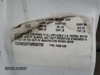2004 Pontiac Grand Am SE with VIN 1G2NE52F74M580789, listed as a Copart auction lot 41447845 with 0 mi miles and Salvage Title. Bid and sale history available at carsss.com. Image 12.