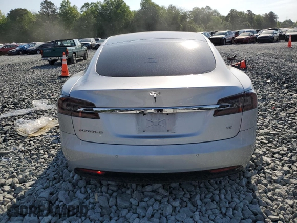 2017 Tesla Model S 60 with VIN 5YJSA1E15HF203248, listed as a Copart auction lot 54923855 with 84,214 mi miles and Salvage title. Bid and sale history available at DreamBid. Image 6.