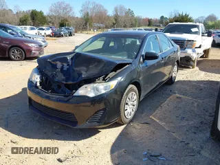 2014 Toyota Camry L with VIN 4T4BF1FK8ER444573, listed as a IAAI auction lot 41815381 with 162,662 mi miles. Bid and sale history available at carsss.com. Image 2.