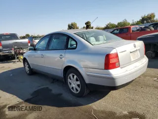 2001 Volkswagen Passat z VIN WVWAC63B41P013693, wystawiony jako Copart lot #74254064 z przebiegiem 106 707 mil mil oraz Szkoda całkowita • Salvage title. Historia ofert i sprzedaży dostępna na DreamBid. Obrazek 2.