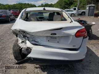 2016 Ford Focus SE с VIN 1FADP3F29GL323601, выставлен на аукционе Copart как лот 56407185 с пробегом 57 000 миль миль и Списание • Salvage title. История ставок и продаж доступна на DreamBid. Изображение 6.