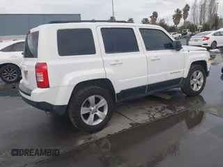 2014 Jeep Patriot Sport with VIN 1C4NJRBB3ED509117, listed as a IAAI auction lot 41799057 with 161,663 mi miles. Bid and sale history available at carsss.com. Image 4.