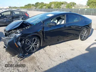 2024 Toyota Prius LE with VIN JTDACAAU8R3038090, listed as a IAAI auction lot 41518657 with 173 mi miles. Bid and sale history available at carsss.com. Image 2.