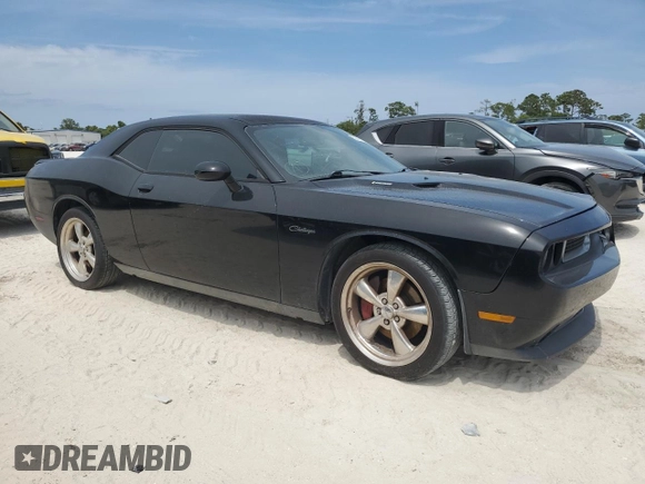 2012 Dodge Challenger R/T Classic z VIN 2C3CDYBT8CH254809, wystawiony jako Copart lot #52767135 z przebiegiem 122 448 mil mil oraz Szkoda całkowita • Salvage title. Historia ofert i sprzedaży dostępna na DreamBid. Obrazek 4.