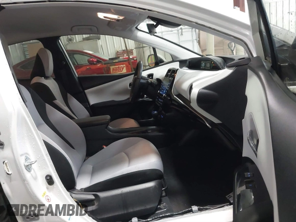 2021 Toyota Prius LE with VIN JTDL9MFU9M3025214, listed as a IAAI auction lot 41375860 with 76,259 mi miles and . Bid and sale history available at DreamBid. Image 5.